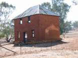 The old mud brick and iron houses at Canterbury were home to many Noongar families, including the Cuimara and Taylor families who worked the New Norcia farms where the house is located. One house is still standing and has a well for water at the side.  The house is on Great Northern Highway 2km south of New Norcia. Courtesy SWALSC